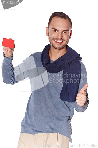 Image of Man showing blank credit card