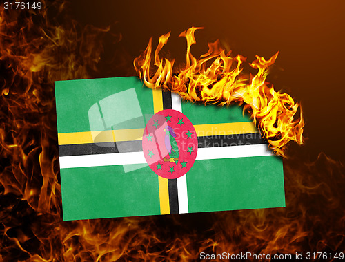 Image of Flag burning - Dominica