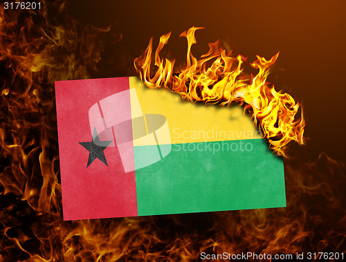 Image of Flag burning - Guinea Bissau