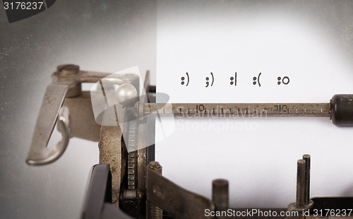 Image of Old typewriter with paper