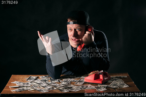 Image of startled man with phone 
