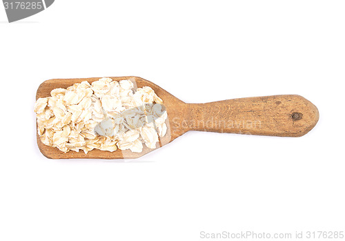 Image of Oat flakes on shovel