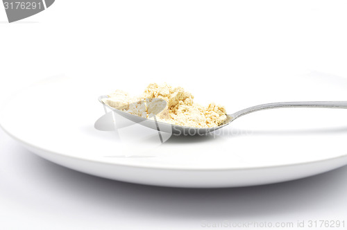 Image of Lupin flour on wooden shovel