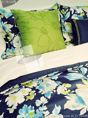 Image of Blue and green bed linen with floral design