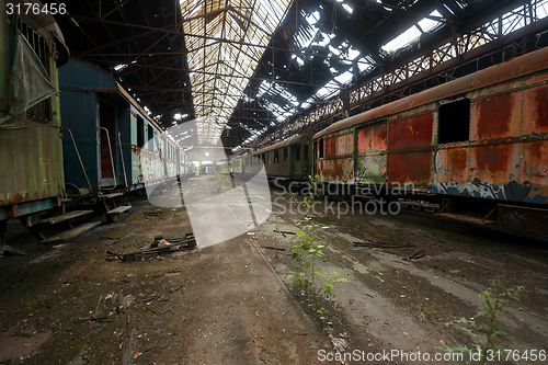 Image of Cargo trains in old train depot