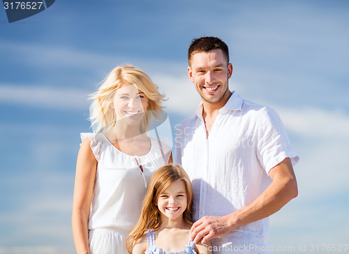 Image of happy family with blue sky