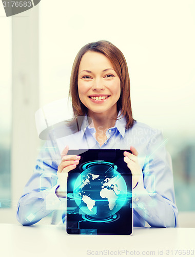 Image of smiling businesswoman with tablet pc computer