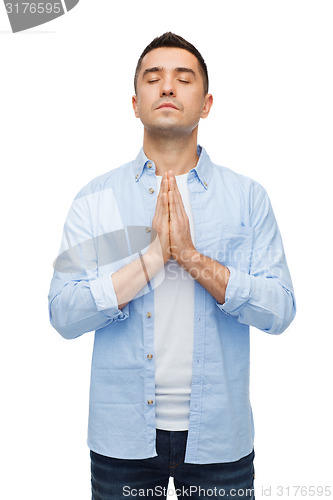 Image of happy man praying