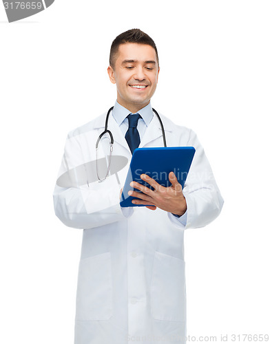 Image of smiling male doctor in white coat with tablet pc