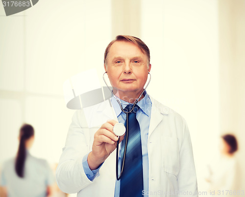 Image of smiling doctor or professor with stethoscope