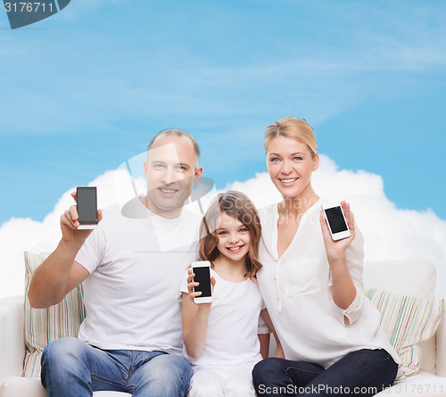 Image of happy family with smartphones