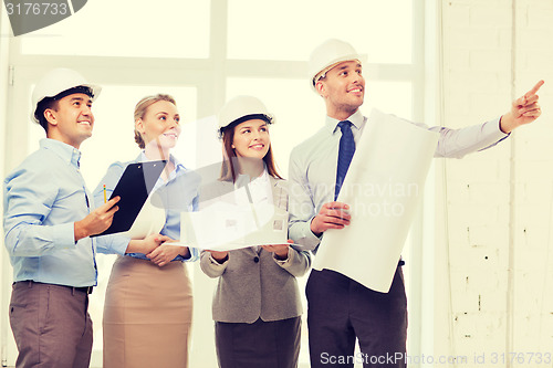 Image of happy business team in office