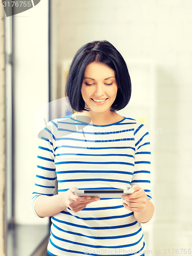 Image of happy teenage girl with tablet pc computer