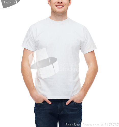 Image of smiling young man in blank white t-shirt
