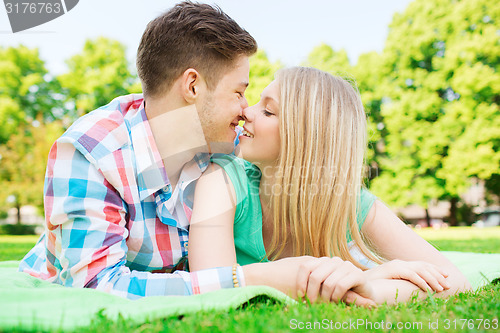 Image of smiling couple in park