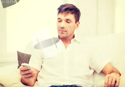 Image of buisnessman with smartphone