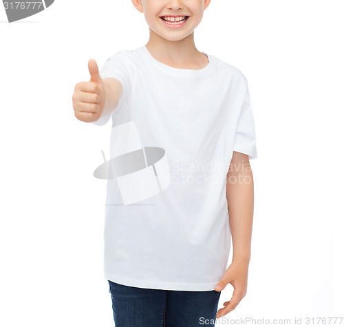 Image of boy in blank white t-shirt showing thumbs up