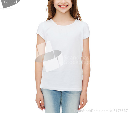 Image of smiling little girl in white blank t-shirt