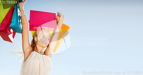 Image of woman with shopping bags