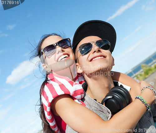 Image of teenagers having fun outside