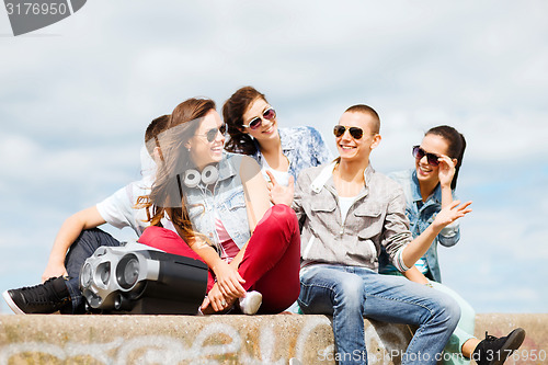 Image of group of teenagers hanging out