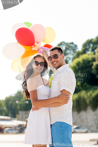 Image of smiling couple in city