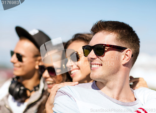 Image of group of teenagers hanging out