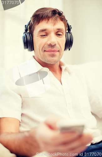 Image of man with headphones listening to music