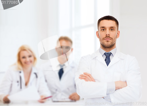 Image of male doctor in white coat