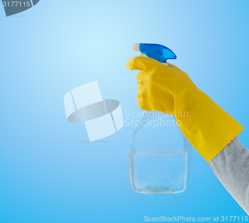Image of close up of hand with cleanser spraying