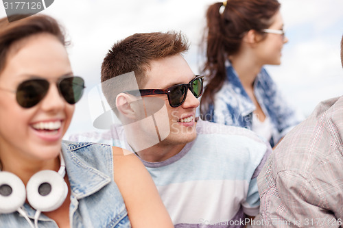 Image of group of teenagers hanging out