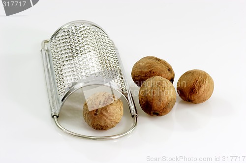 Image of Nutmegs with Grater