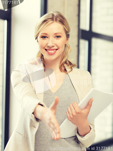 Image of woman with an open hand ready for handshake