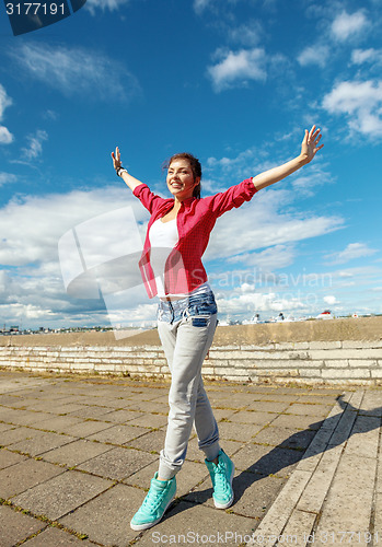 Image of beautiful dancing girl in movement