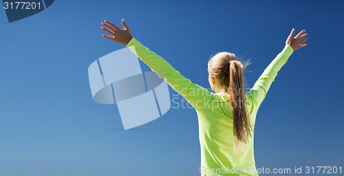 Image of woman doing sports outdoors