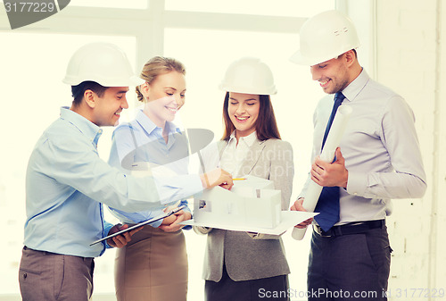 Image of happy business team in office