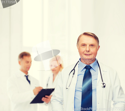 Image of smiling doctor or professor with stethoscope