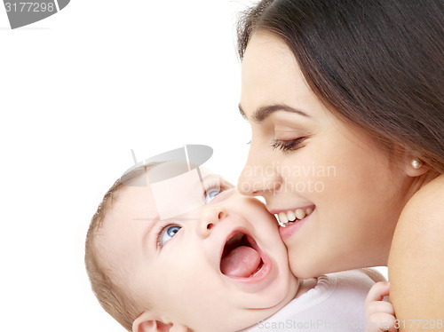 Image of mother kissing her baby