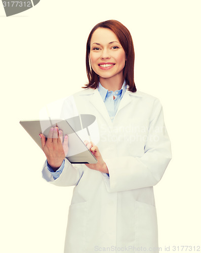 Image of smiling female doctor and tablet pc computer