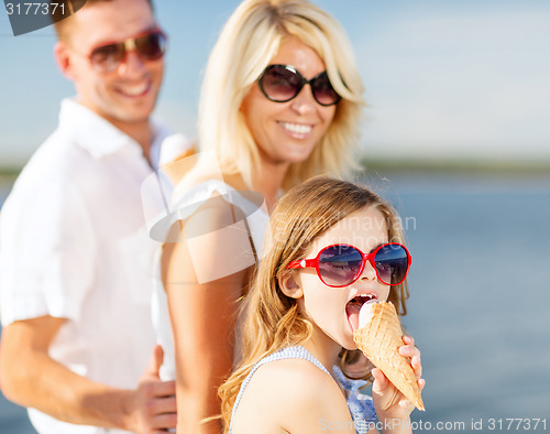 Image of happy family eating ice cream