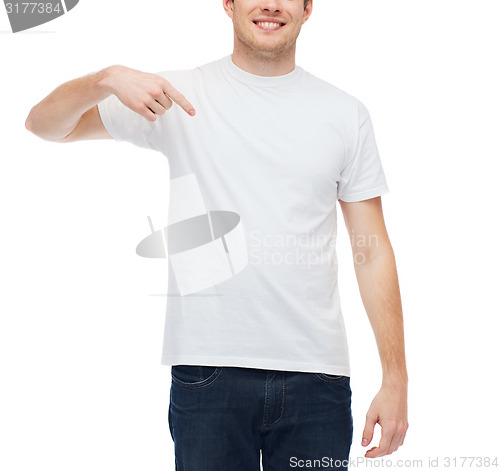 Image of smiling young man in blank white t-shirt