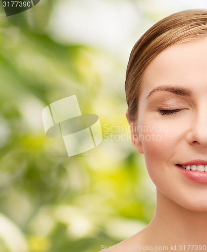 Image of face of beautiful woman with closed eyes