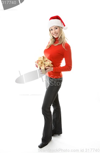 Image of Happy Woman holding Christmas Present