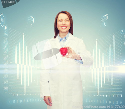 Image of smiling female doctor with heart