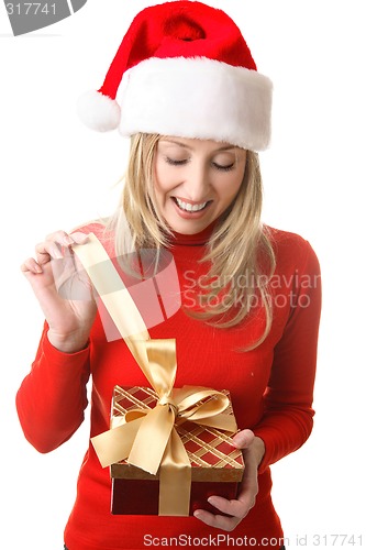 Image of Female opening a present