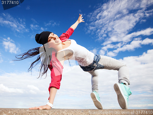 Image of beautiful dancing girl in movement