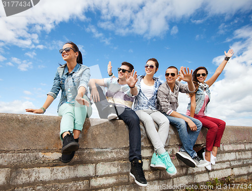 Image of group of teenagers hanging out