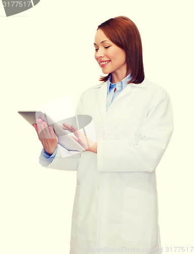 Image of smiling female doctor and tablet pc computer