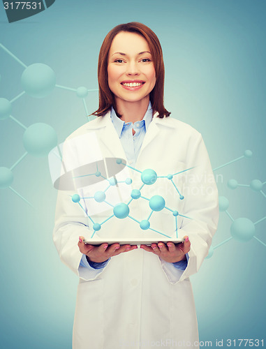 Image of smiling female doctor and tablet pc computer