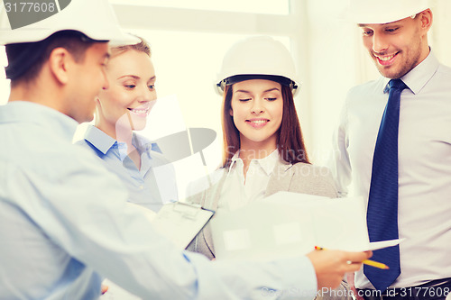 Image of happy business team in office